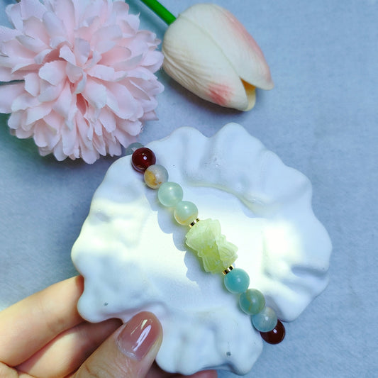 A lucky featuring blue calcite & carnelian & Xiuyan jade lotus spacer bracelet