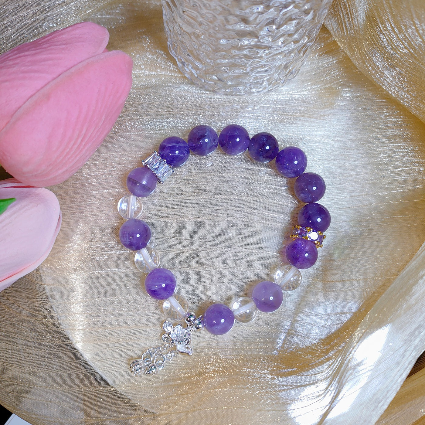 A Symbol of Good Fortune and Wisdom Amethyst & stering silver 925 lotus charm Bracelet