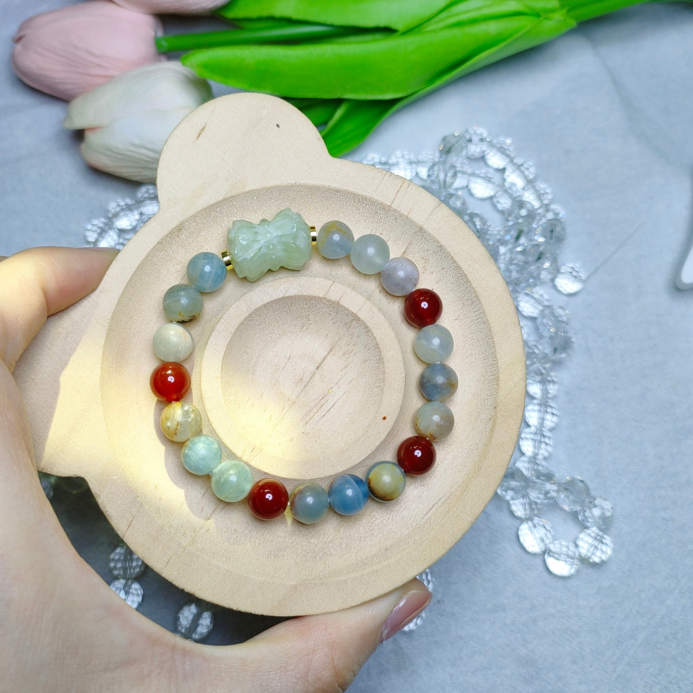 A lucky featuring blue calcite & carnelian & Xiuyan jade lotus spacer bracelet