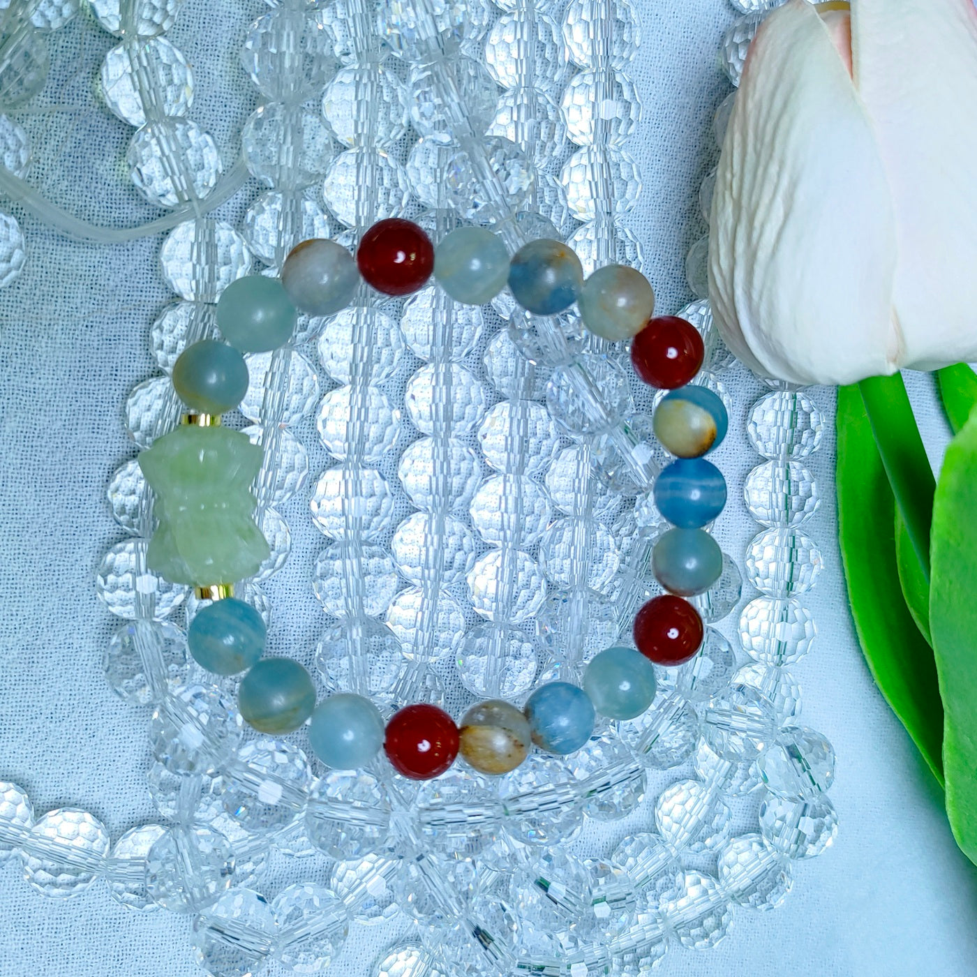 A lucky featuring blue calcite & carnelian & Xiuyan jade lotus spacer bracelet